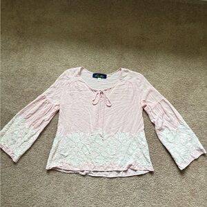 Pink long sleeve top with white embroidered floral